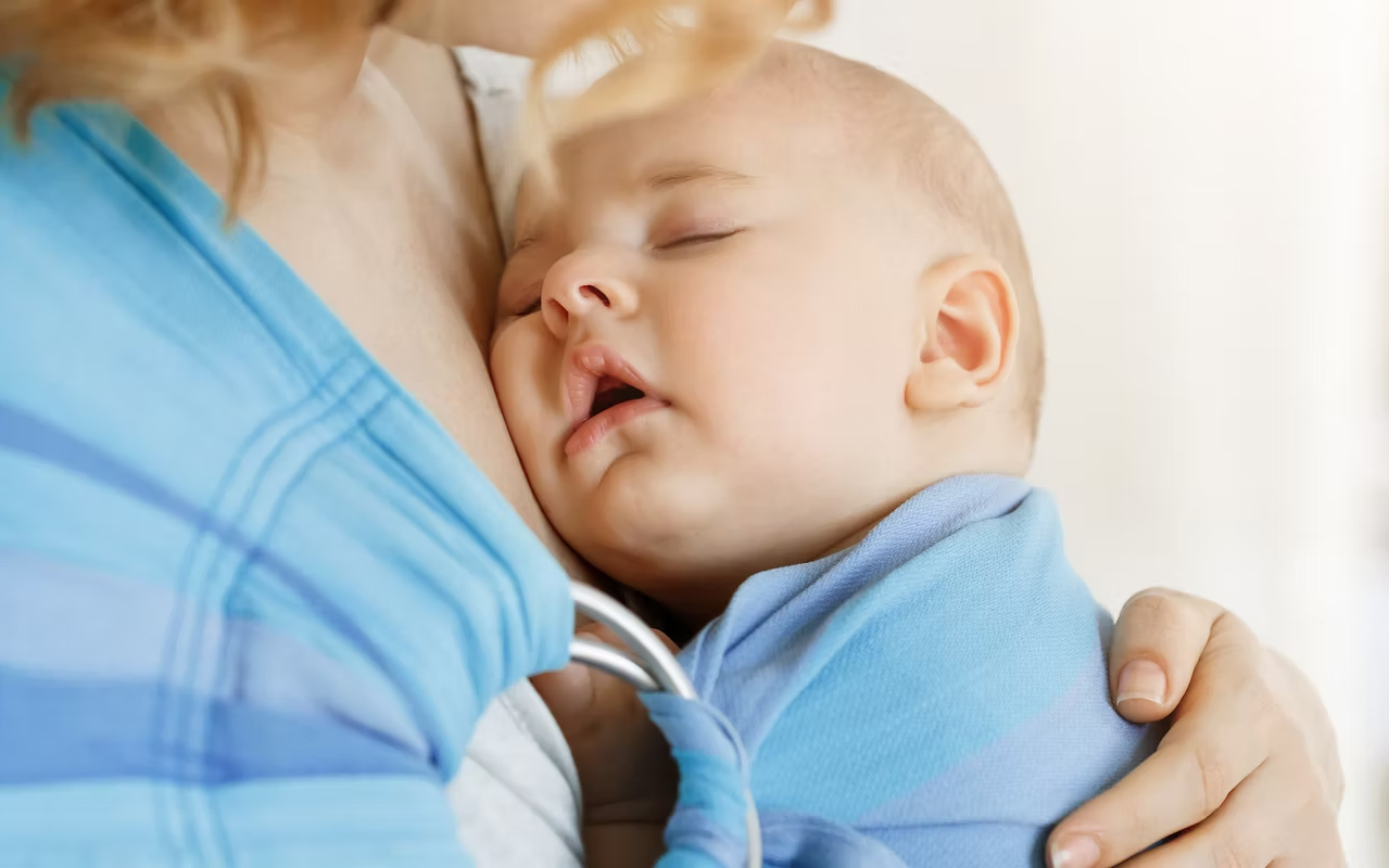 Young mother with newborn baby
